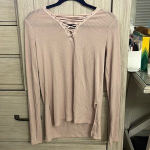 Light pink long sleeve cross front shirt